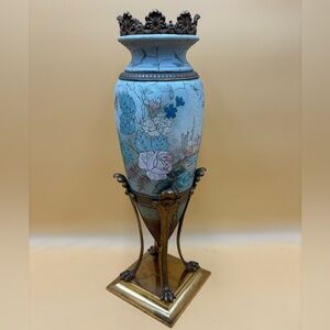Hand painted copper vase with bronze accents and talon feet base, castle